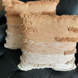 Copper and cream thrown pillows